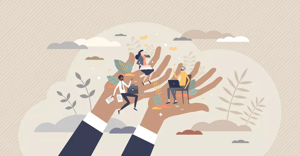Funcionário feliz com ótima qualidade de vida no trabalho